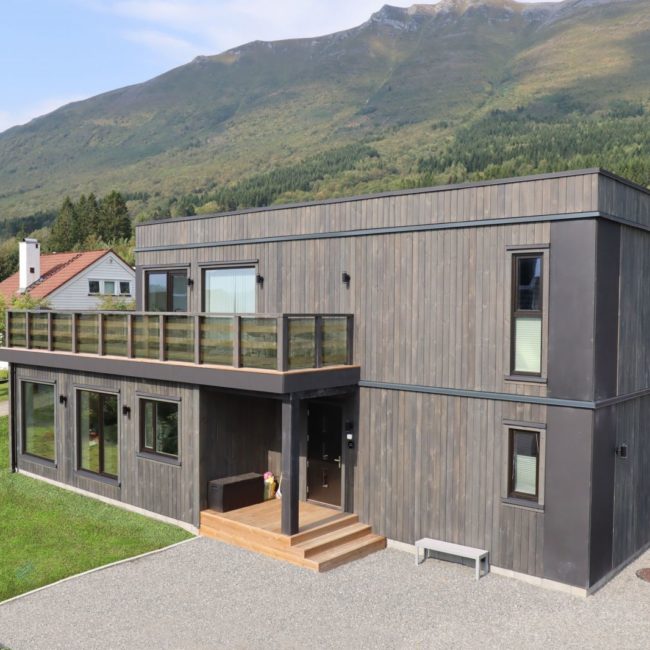 Shipping and installation of a new series of two-story houses for Norway